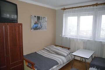 Фото номера Четырехместный номер Фермерские дома Agroturystyka U Baltazara г. Душники-Здруй 2
